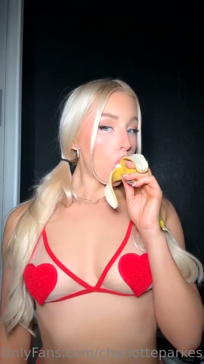 Watch Charlotte Parkes sucking on a banana in a sexy lingerie